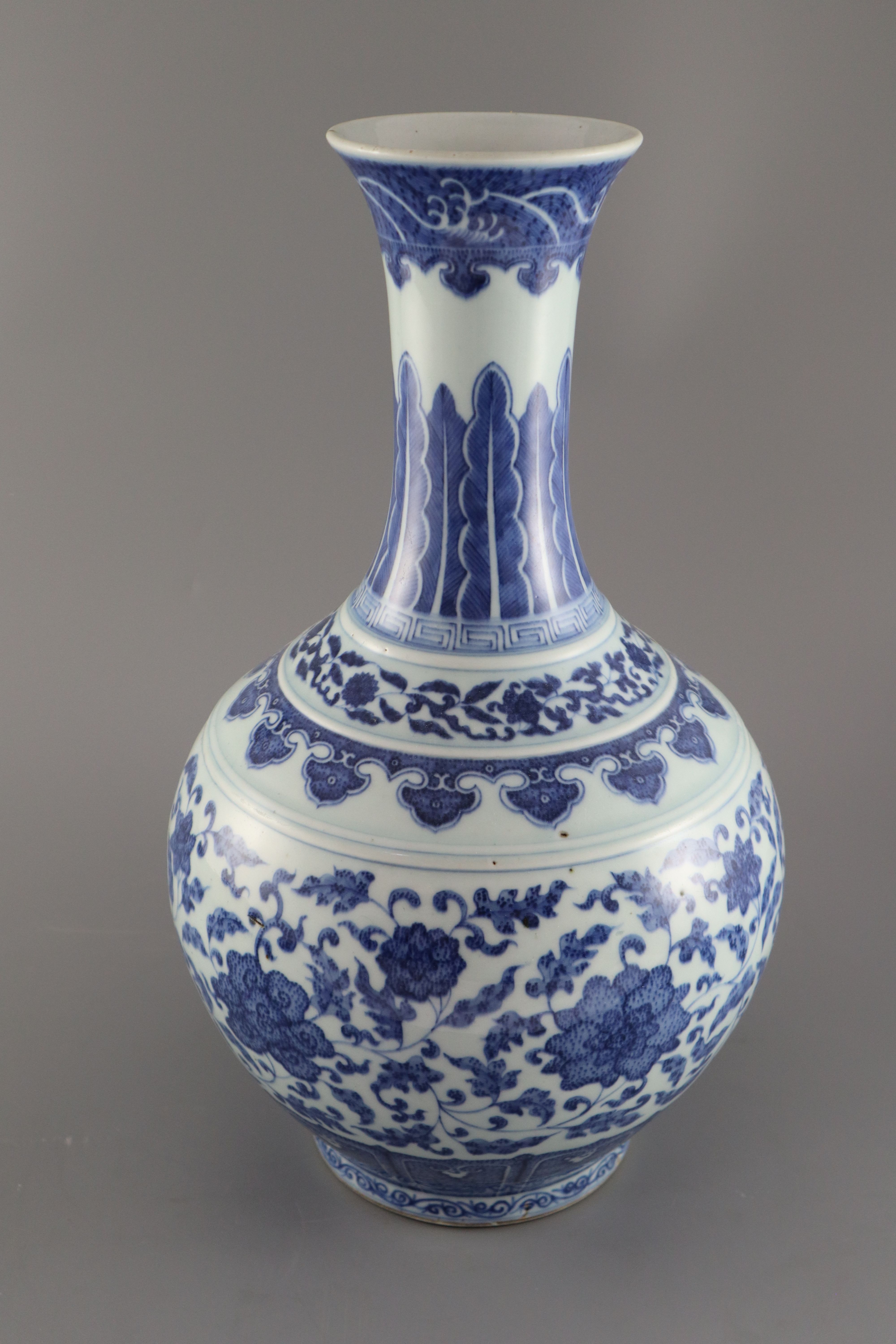 A Chinese blue and white Ming style bottle vase, Qianlong six character mark but later, 41.5cm high